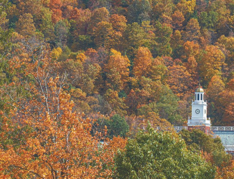 Delaware Academy peeks through fall foliage as seen from SUNY Delhi.